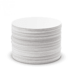 Badger & Dodo. A stack of round, white AeroPress Filters neatly arranged.