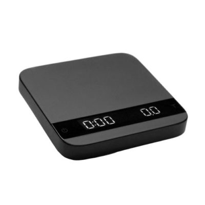 Badger and Dodo Coffee Roasters: The Acaia Lunar - Black (2021) is a sleek digital kitchen scale with a glossy surface and dual LED displays showing 0.00. Its minimalist design includes touch-sensitive buttons for precise measurements, reminiscent of classic Acaia elegance.