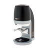 Badger and Dodo Coffee Roasters: The Puqpress Q2 is a stylish espresso tamper with a modern black and silver design, featuring a curved handle and digital side display, mounted on a light-colored base.