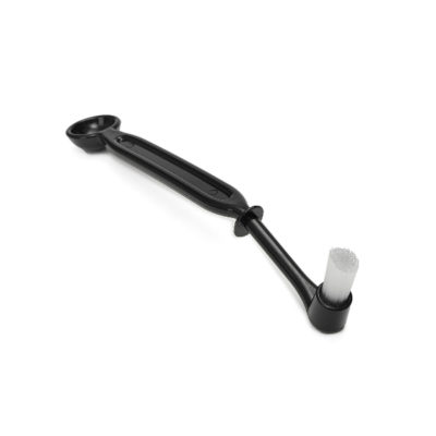 Badger and Dodo Coffee Roasters: An ergonomic black espresso brush with a long handle, featuring a small round brush at one end and a scoop on the other, perfect for coffee machine cleaning. Its design ensures efficient and easy maintenance of espresso machines.