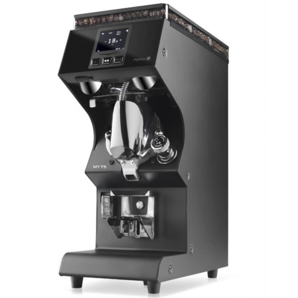 Badger and Dodo Coffee Roasters: The sleek, black Victoria Arduino MYG75 espresso grinder machine with a digital display boasts a polished metal grinding mechanism for precise coffee grinding. The Mythos-inspired, modern design is compact yet powerful, making it ideal for both professional and home use.