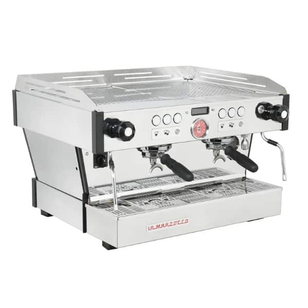 Badger and Dodo Coffee Roasters: The La Marzocco Linea PB commercial espresso machine boasts dual portafilters and a sleek stainless steel body. Its front panel features intuitive control buttons and a pressure gauge, while steam wands grace either side for barista-style precision.