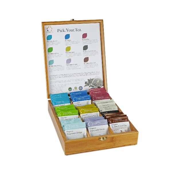 Badger and Dodo Coffee Roasters: A beautifully crafted Tea Box made of wood, filled with assorted Solaris Tea bags in vibrant colors. The lid elegantly displays tea options, complete with descriptions and their matching colored labels.