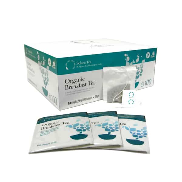Badger and Dodo Coffee Roasters: A box of Solaris Organic Breakfast Tea with three sachets displayed in front. The elegant packaging, adorned with green and blue accents, reveals a generous offering of 100 tea sachets inside, perfect for starting your day right.