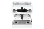 Badger & Dodo. Front view of a white La Marzocco Linea Mini - Bianca espresso machine featuring dual gauges and a portafilter.