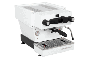 Badger & Dodo. The La Marzocco Linea Mini - Bianca espresso machine features gauges, a steam wand, and drip tray, all elegantly branded with La Marzocco on the front.