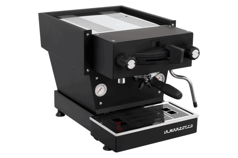 Badger & Dodo. The La Marzocco Linea Mini - Nera is a black espresso machine with silver accents and a steam wand, shown from the front-left angle.