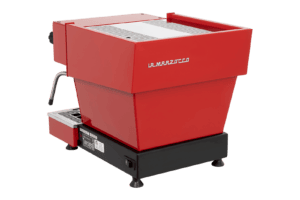 Badger & Dodo. A La Marzocco Linea Mini - Rossa espresso machine with a steam wand and silver grate, shown from the back.