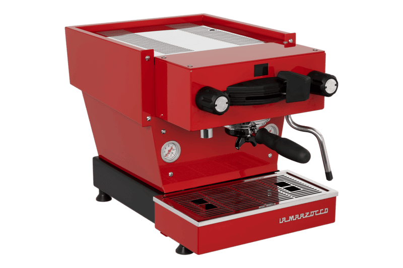 Badger & Dodo. A La Marzocco Linea Mini - Rossa stands out with its portafilter and steam wand against a crisp white background.