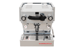 Badger & Dodo. Front view of a La Marzocco Linea Mini - Silver espresso machine, featuring dual gauges and a portafilter.