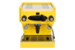 Badger & Dodo. Front view of the La Marzocco Linea Mini - Yellow featuring black handles and dual gauges.