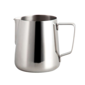 Badger and Dodo Coffee Roasters: The 475ml / 16oz Milk Pitcher, made of stainless steel with a spout and handle, is ideal for steaming milk in coffee preparation and is highlighted against a plain white background.