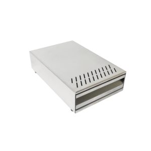 Badger and Dodo Coffee Roasters: A sleek rectangular Knock Box Drawer with stainless steel casing, featuring a front slot and vent holes on top, set against a white background.