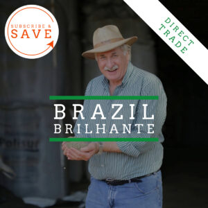 Badger & Dodo. Smiling man in a hat holds coffee beans; text reads Brazil - Rio Brilhante, featuring Subscribe & Save and Direct Trade.