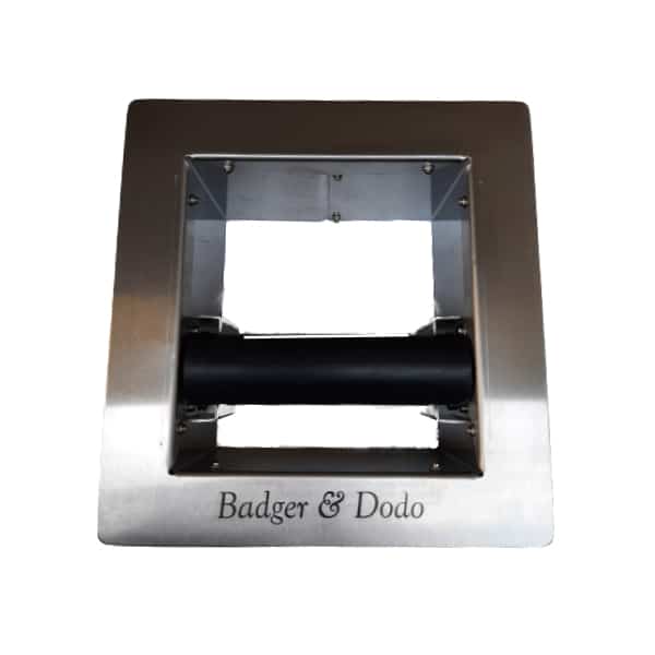 Badger and Dodo Coffee Roasters: A heavy-duty open knockout box with a square frame and black handle elegantly centered. The engraved text Badger & Dodo adorns the bottom edge, showcasing robust craftsmanship for true coffee enthusiasts.