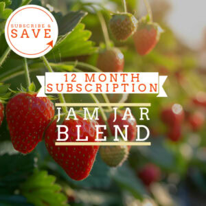 Badger and Dodo Coffee Roasters: A close-up of ripe strawberries on a sunlit plant features the text: Pay Once 1 Year Coffee Subscription Jam Jar. A corner label reads Subscribe & Save with an arrow.