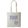 Badger and Dodo Coffee Roasters: The Badger and Dodo Tote Bag (Blue) is a stylish beige accessory with Irish Badger & Dodo Roasting Coffee Since 2008 in blue text and We Are 85+ beneath it. With two sturdy handles, its perfect for carrying your essentials.