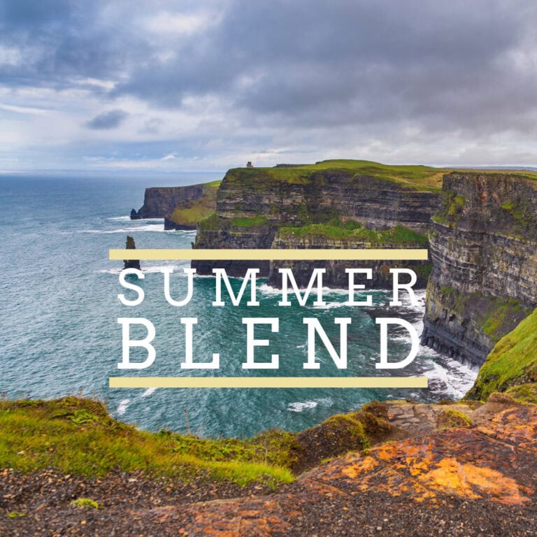Badger & Dodo. Cliffs by the ocean beneath a cloudy sky, featuring the text “Summer Blend” to capture the refreshing essence of this product.