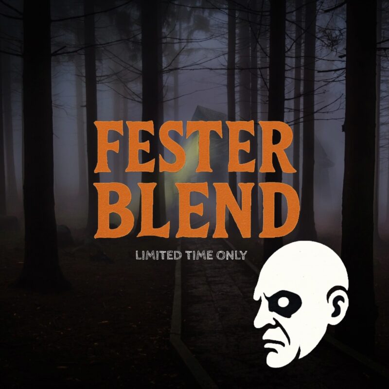 A dark, foggy forest scene with tall trees and a faintly lit cabin in the background. Large orange text in the center reads “FESTER BLEND,” with smaller gray text below that says “LIMITED TIME ONLY.” At the bottom right, there is a black and white illustration of a bald, grim-faced man in profile.