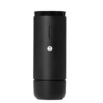 A tall, cylindrical black travel mug with a matte finish and a small hourglass-shaped button on the front.